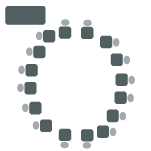 Card tables arranged in circle formation with a table available for handouts. 