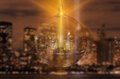 New York City at night with glass ornament in forefront