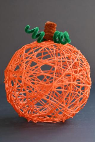 Pumpkin craft made out of yarn
