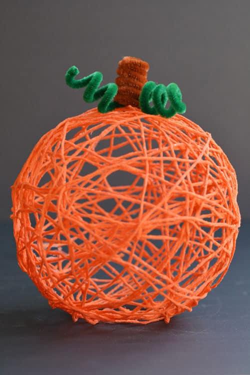 Pumpkin craft made out of yarn