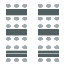 Two columns of chairs with three chairs per row